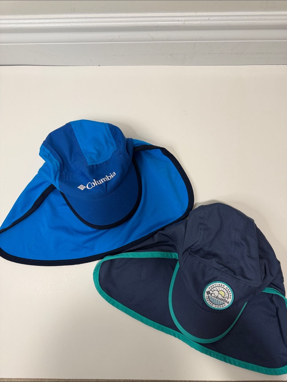 Columbia Kids Sun Hats in Bright Blue and Navy with neck flap uv waterproof cap